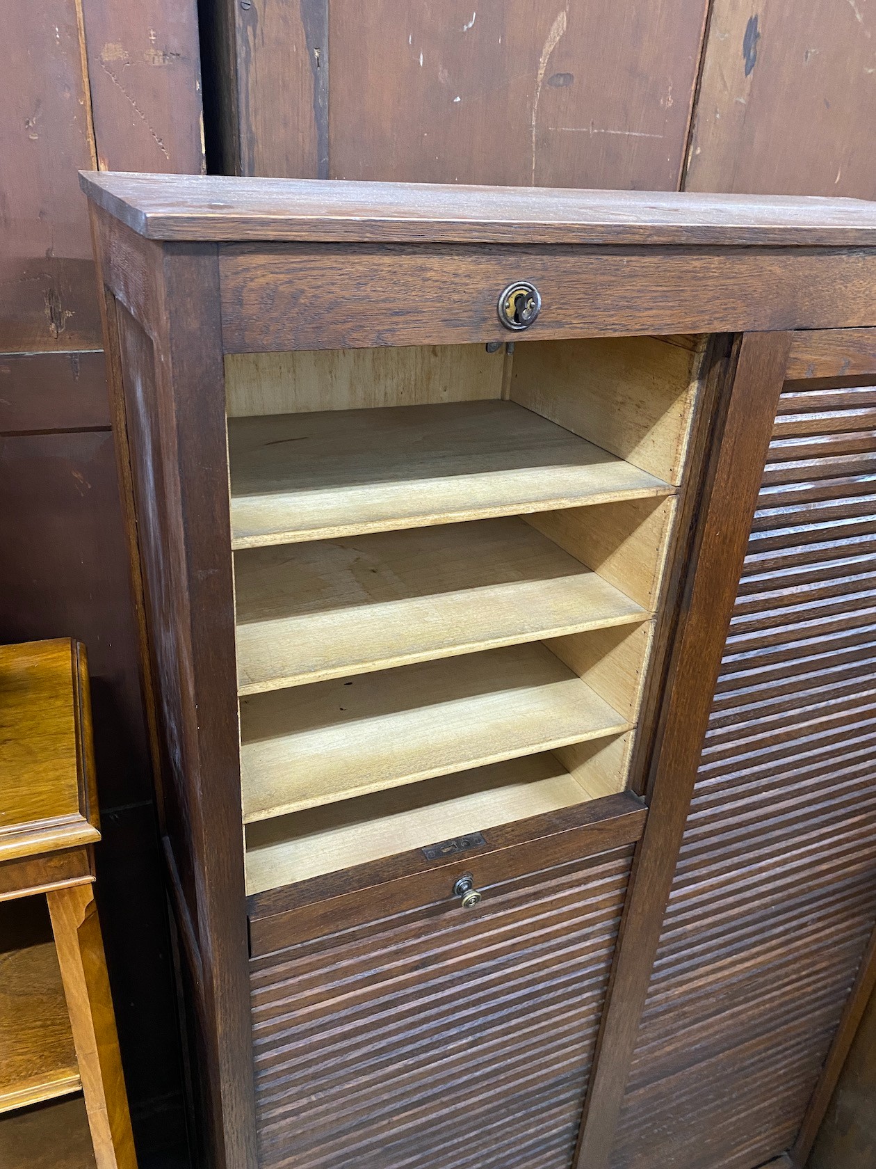 A mid century double fronted tambour shutter filing cabinet, width 89cm, depth 36cm, height 150cm